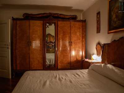 una camera da letto d�epoca,...
